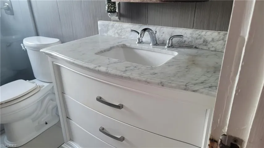 Bathroom featuring toilet and vanity