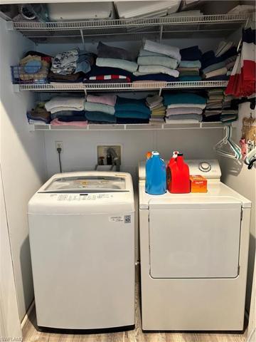 laundry room with washer and dryer
