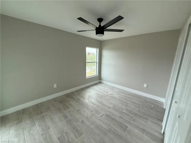 Spare room featuring ceiling fan