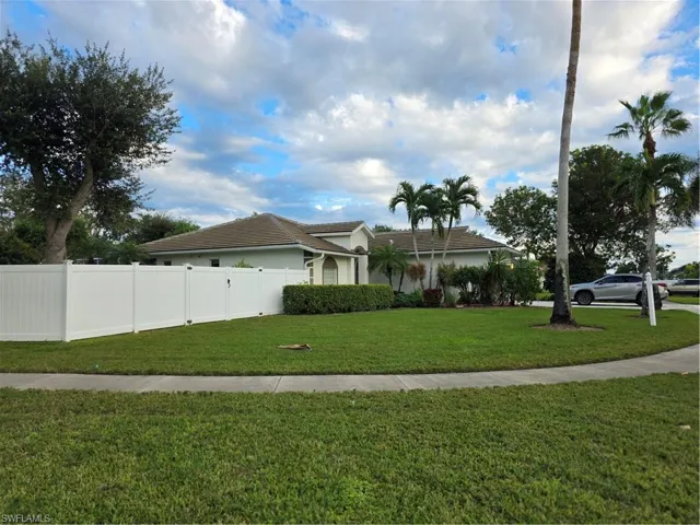 View of front of property featuring stucco siding