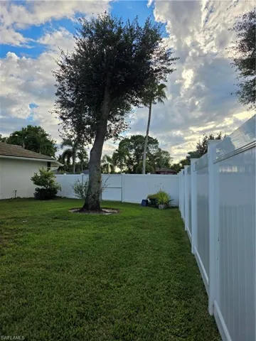 View of fenced backyard