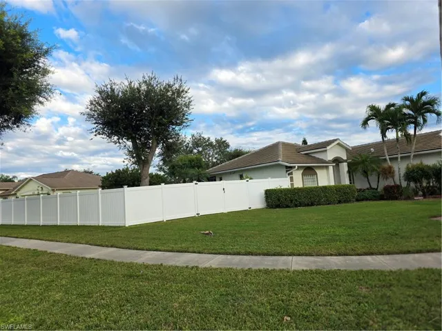 View of side of property with stucco siding