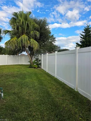 View of fenced backyard