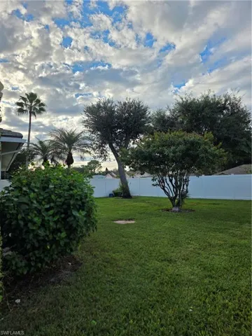 View of fenced backyard
