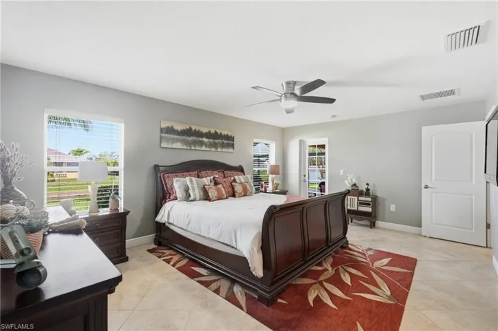 Spacious room featuring neutral-toned walls and tile flooring