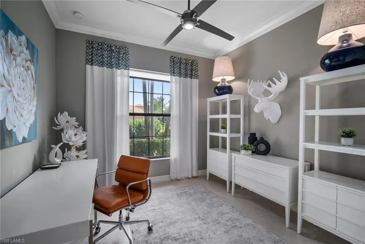 Bedroom/Office featuring ceiling fan and crown molding