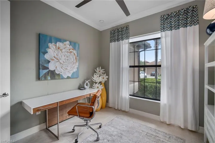 Bedroom/Office area featuring ornamental molding and ceiling fan
