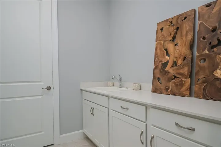 Laundry Sink - Complete storage & cabinets