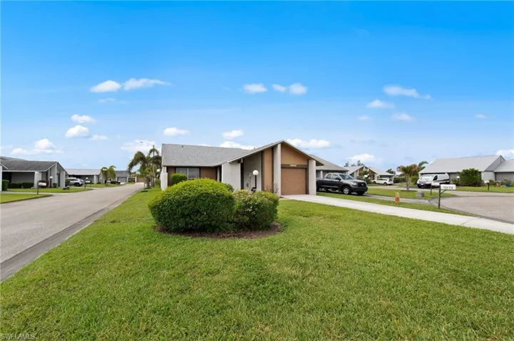 Front view with beautiful landscping