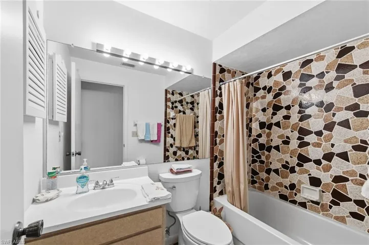 Guest bathroom with new vanity, faucet and toilet (2026)
