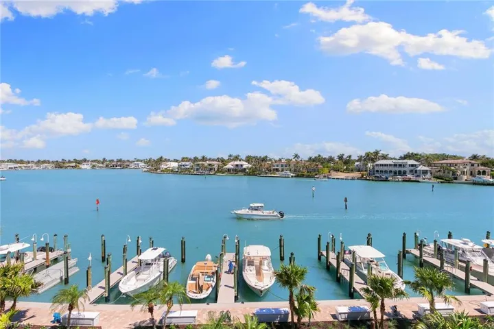Water view featuring a dock and boat lift