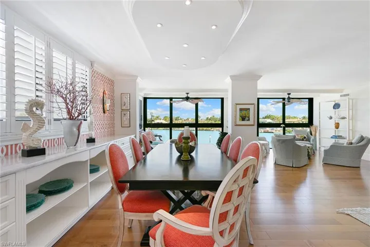 Dining space with light wood-style flooring and recessed lighting