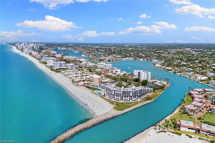 View of urban area featuring expansive beach