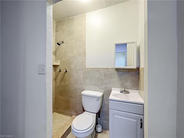 Additional full bath in converted garage space