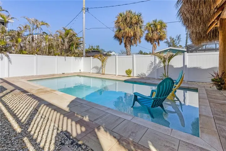 very private yard featuring heated pool and spacious sundeck.