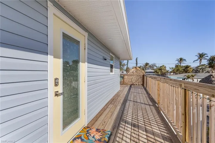 Front entry to the home, deck walkway takes you to the rear deck area and a second home entry.