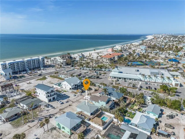 Bird's eye view featuring a short 5 minute walk to the Gulf of Mexico.  Right next door is Publix supermarket and a waterfront, back bay restaurant.