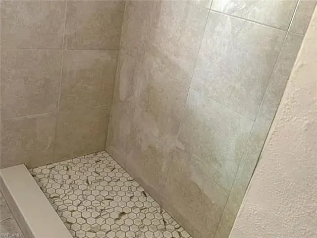 Bathroom with a stall shower