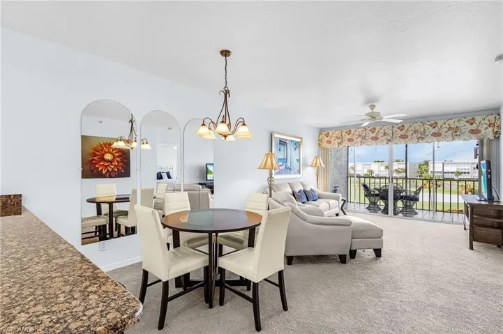 Dining & living areas with a view out to the golf course