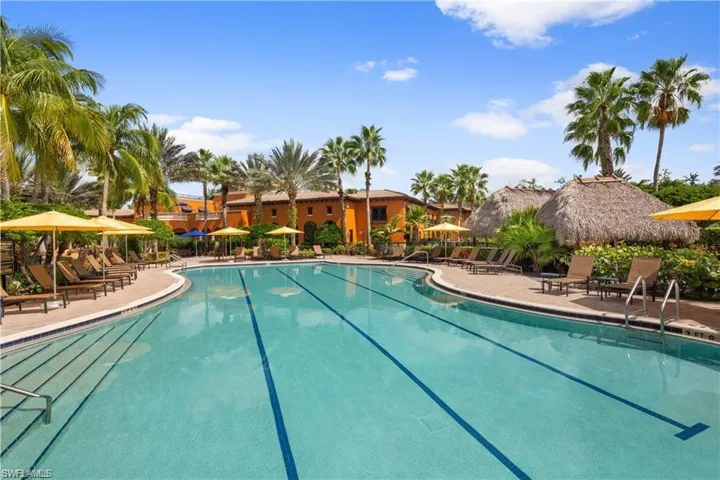 Community pool with a patio area