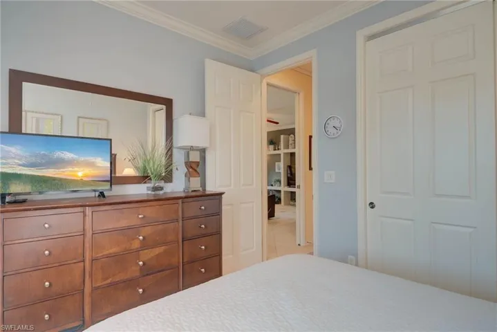Bedroom featuring ornamental molding