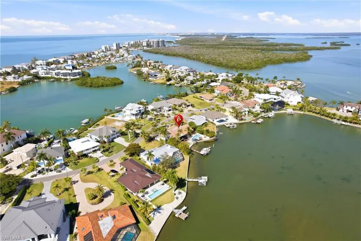 Aerial view of property's location shows the home's close proximity to Bonita Beach and the Gulf of America.