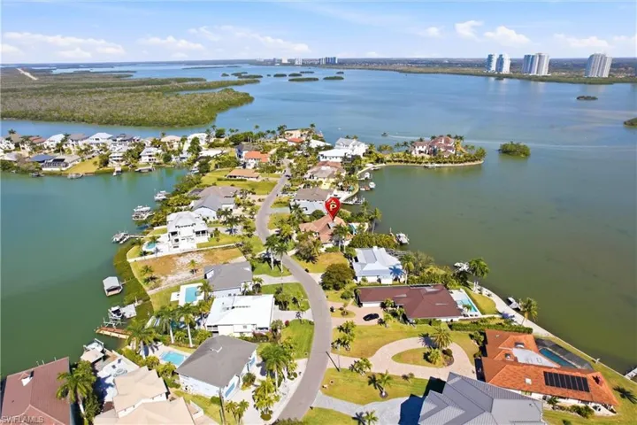 Aerial overview of property's location showing Estero Bay.