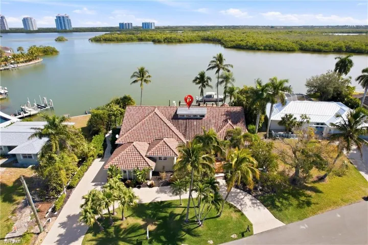 View of the backyard bay with the high-rises of Bonita Bay in the background.