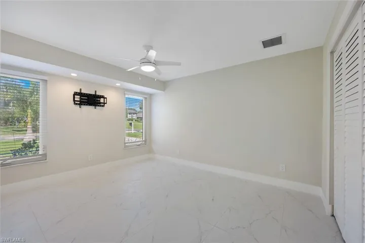 The guest bedroom is privately tucked away from the rest of the home.