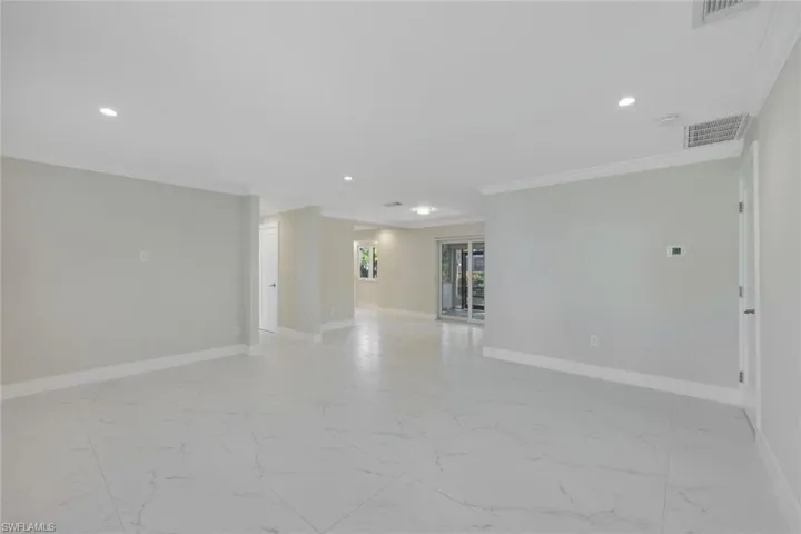 Living room and dining room are open to one another.
