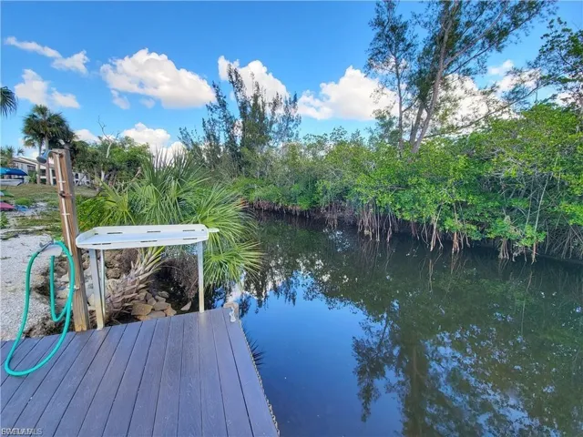 Dock featuring a water view