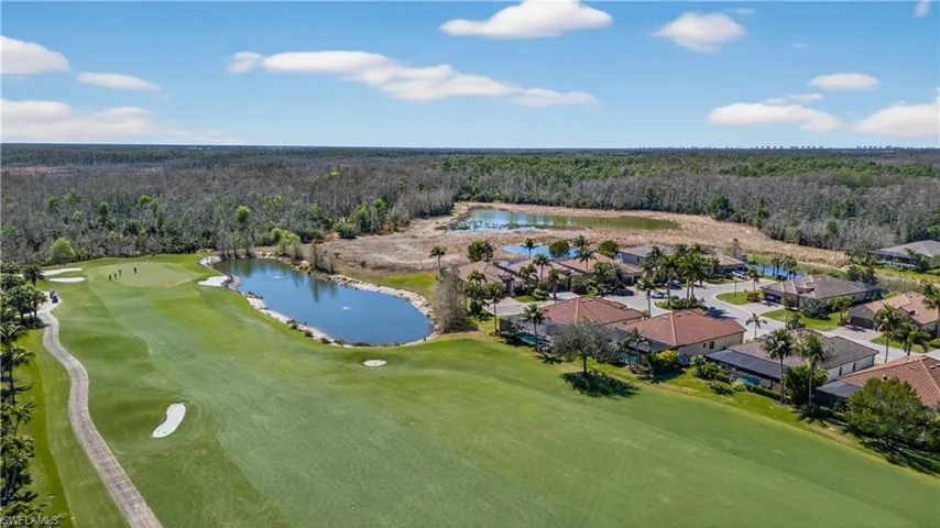 Bird's eye view of a forest and a golf club