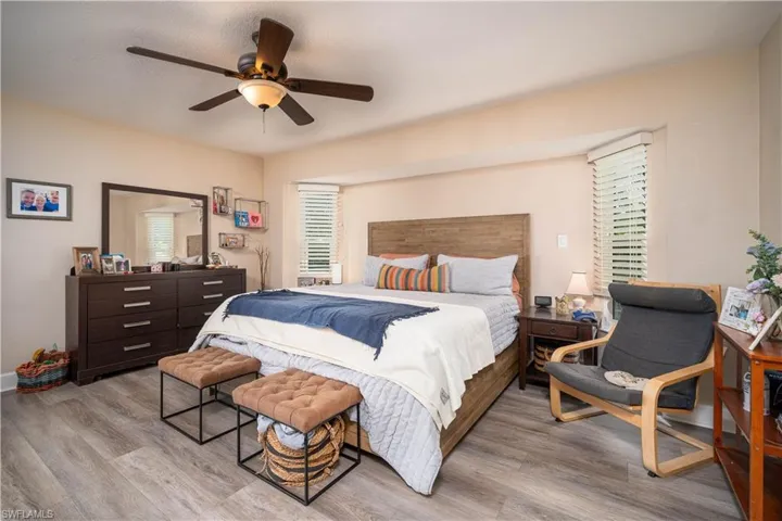 Bedroom with light wood-type flooring and ceiling fan