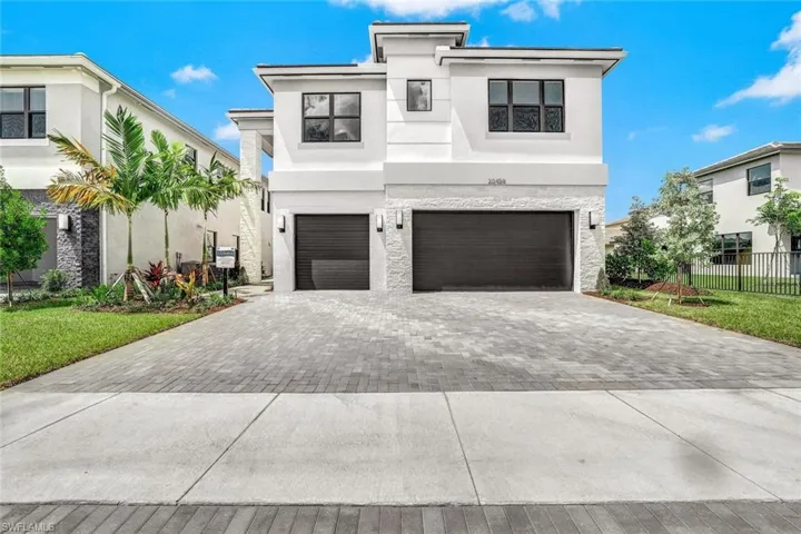 View of front of home with a garage