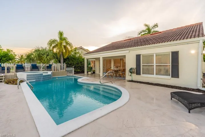 Pool at dusk and the surrounding pool deck and lana which you can make your own great entertaining area!