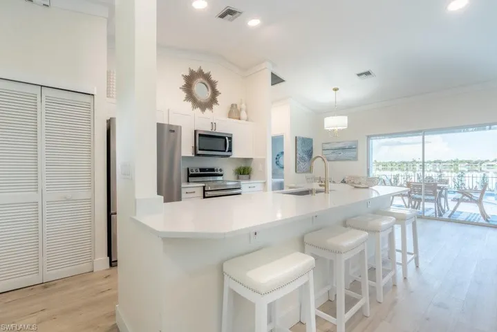 Kitchen is set up for maximum efficiency for the chef and has a new stainless undermount farmers sink with gold fixtures and door hardware. The dining area is close by, and everywhere you look there are incredible views!