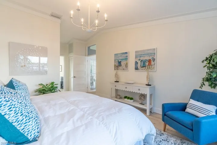 Primary bedroom suite is a sanctuary of light and peace. The beautiful shaker-style doors are found throughout the house.