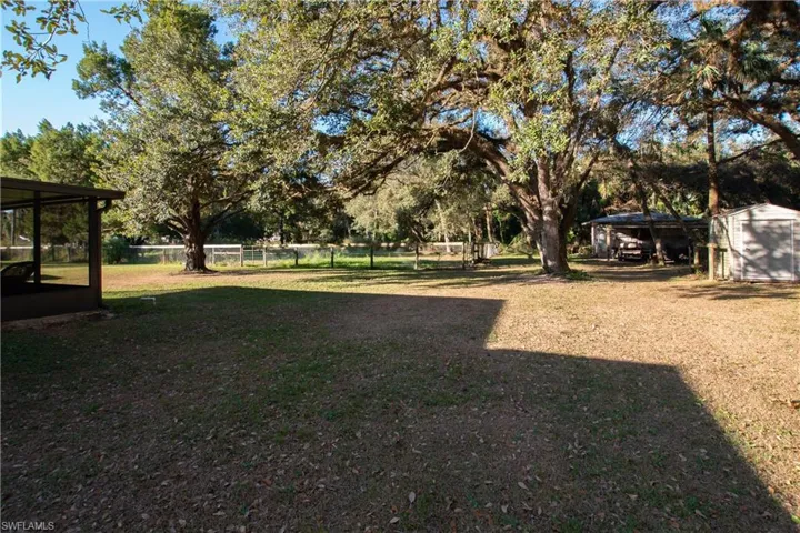 View of side yard and structure