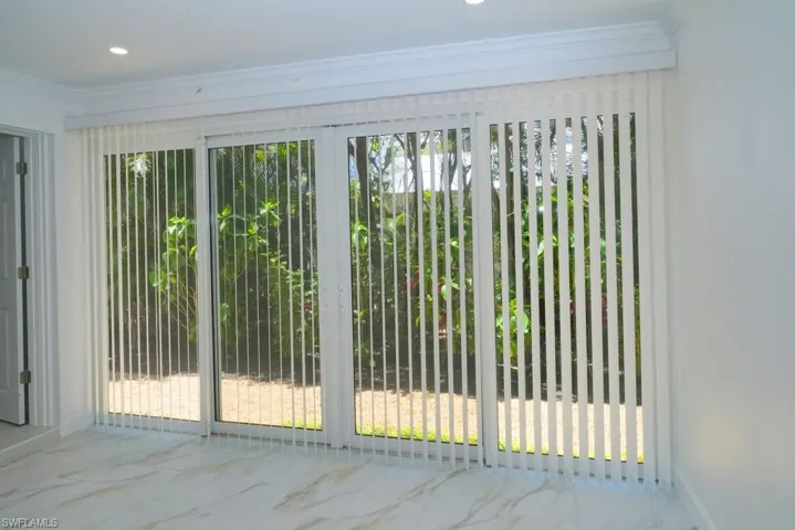 View from enclosed lanai with impact sliders.