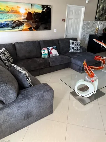 Living room featuring tile patterned flooring