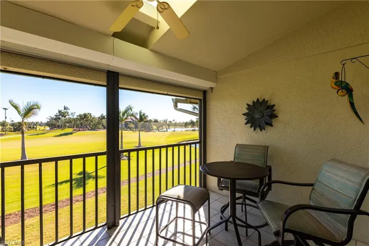 Course Side featuring lofted ceiling and ceiling fan