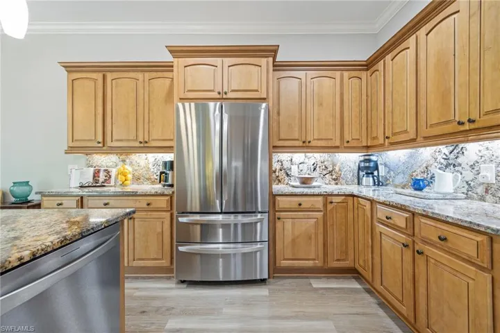 High grade granite counters with matching backsplash.
