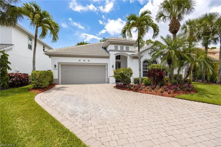 Long pavestone driveway with beautiful curb appeal