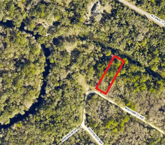 Aerial Map. Outlining the property in red, indicating its location relative to surrounding roads and natural features
