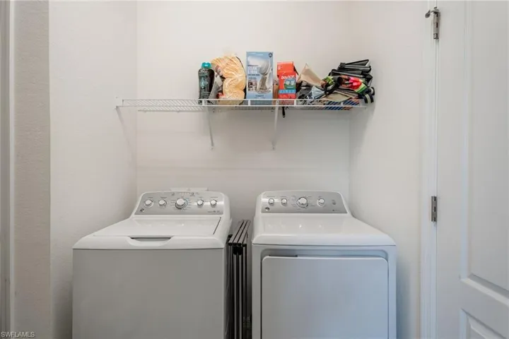 Big indoor laundry room with storage