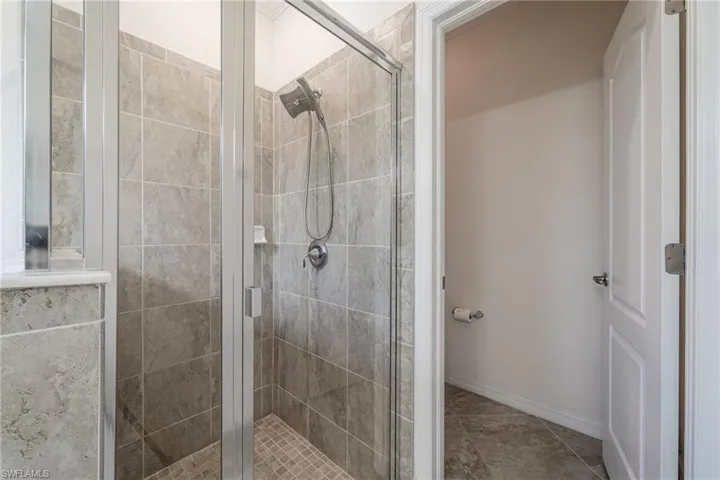 Primary bathroom with big shower & private water room