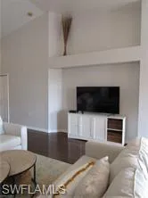 Living room with vaulted ceiling