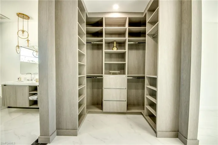 Spacious closet with sink