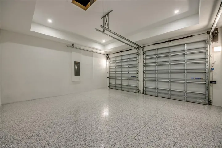 Garage featuring electric panel