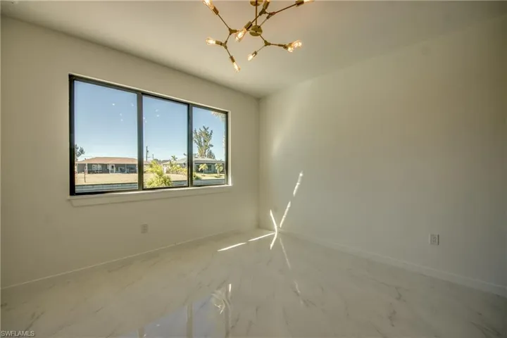 Empty room with a chandelier